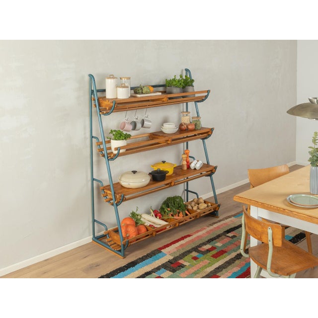 Unique kitchen shelf made from a former medicine ball shelf of the 1950s. High quality cast iron frame and solid pine and...