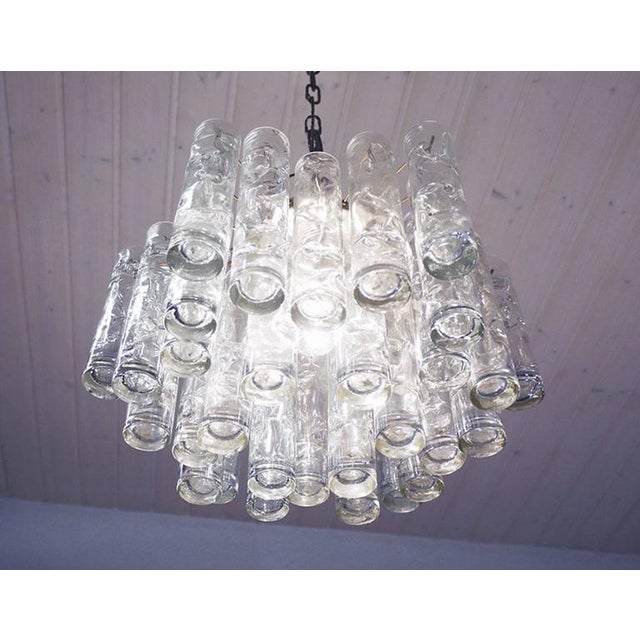Elegant flush mount chandelier with twenty-four hand blown 'lava' murano glass tubes in three different lengths on a brass...