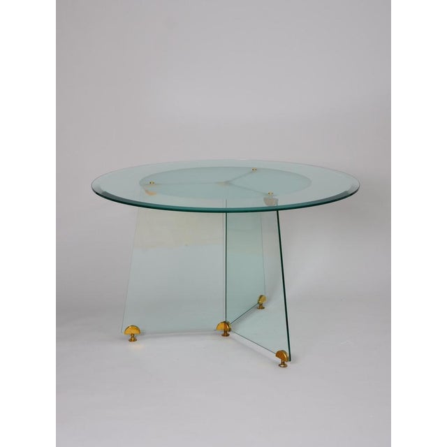 Lovely quality circular glass and brass table.