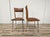 Pair of vintage 1970s chairs with iron and beech frame, and brown upholstered seat and backrest. Perfect for any use, they...