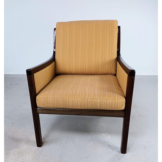 1960s Two fully restored Ole Wanscher mahogny lounge chairs including reupholstery. The two Ole Wanscher lounge chairs...