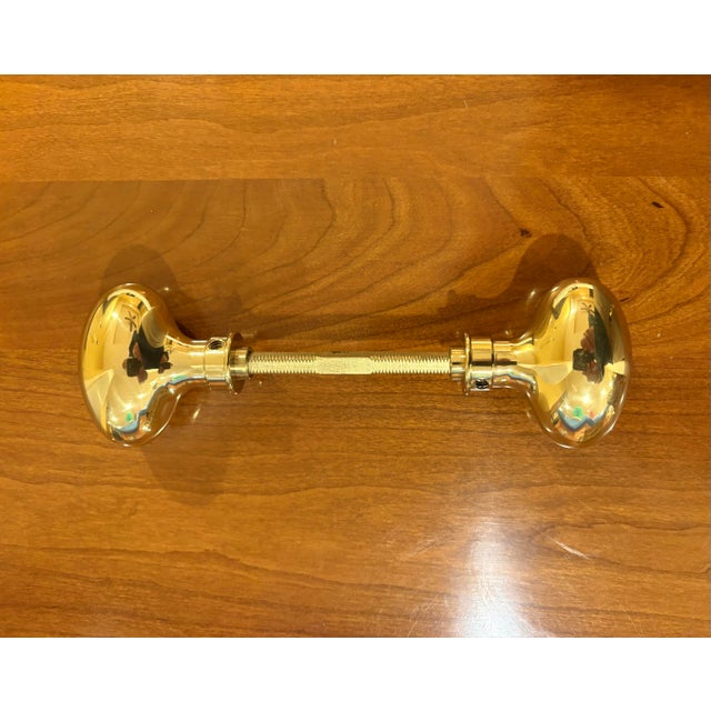 Elegant solid brass set of two interior door knobs from Baldwin Brass with spindle and set screws (5). This top quality...