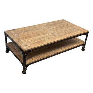 Industrial Riveted Iron Two Tiered Coffee Table + Casters For Sale