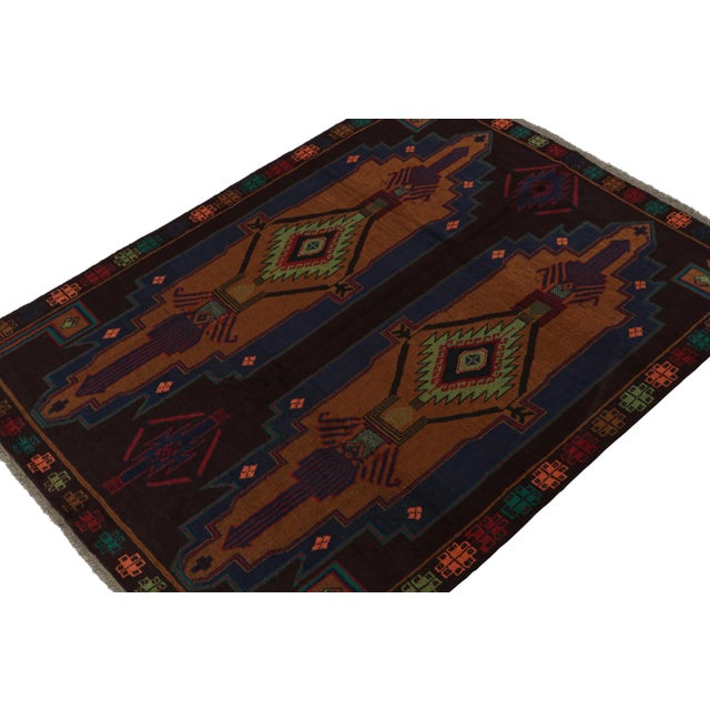 Hand knotted in wool, this 7x8 Baluch rug represents a new line of tribal carpets in the Modern Classics Collection by Rug...