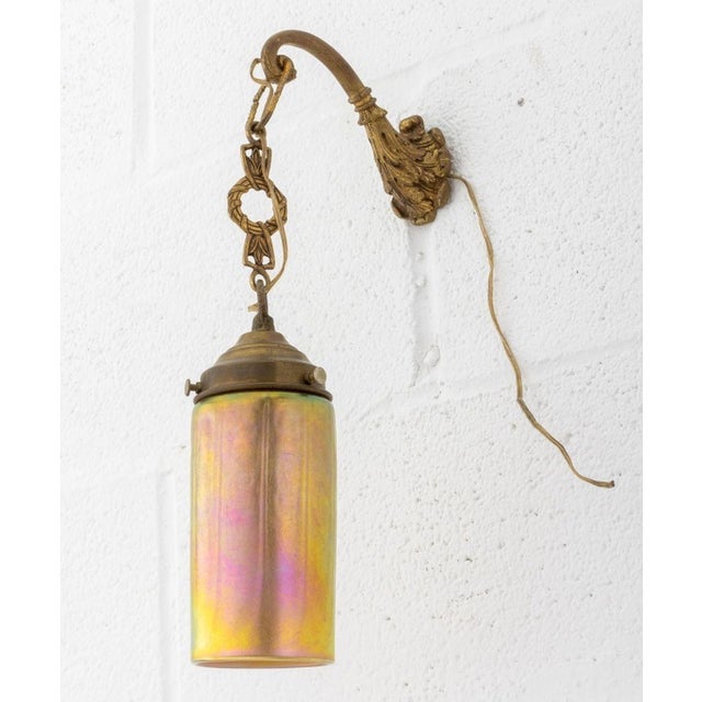 Empire Style Gilt Metal Hanging Wall Light, 20th century, with an art glass shade. 16.5" H x 3" Diameter.