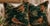 A striking pair of custom designer pillows featuring Game Show in the Emerald colorway. The graphic pattern mixes...