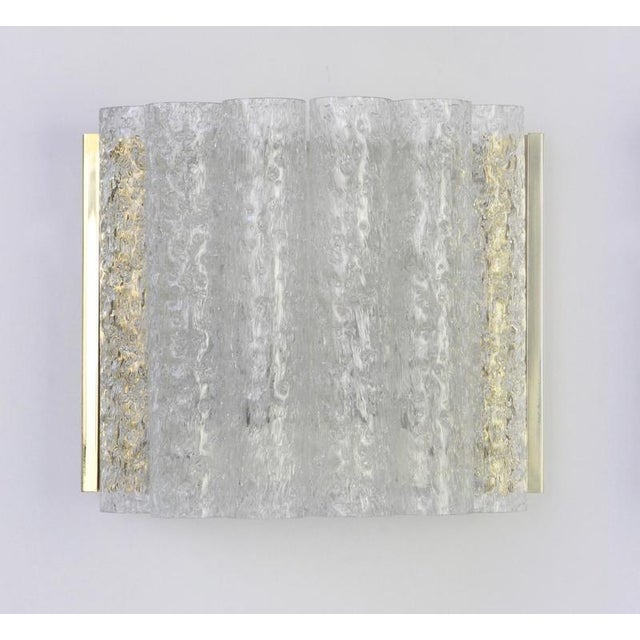 Wonderful pair of midcentury wall sconces with ice glass tubes, made by doria leuchten, germany, manufactured, circa...