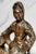 A captivating example of Asian decorative art, this hand-carved wooden sculpture depicts the revered Bodhisattva Guanyin,...