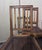 Set of four Louis XVI style carved wood chairs cane seats slatted backs tapered legs