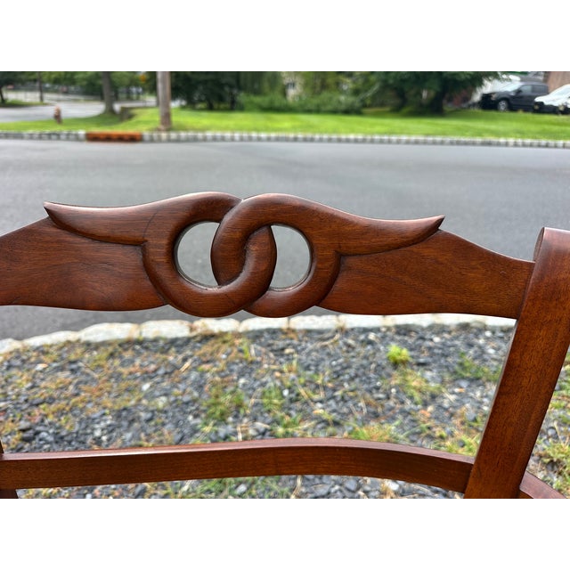 Classic walnut frame and rush seat traditional vintage loveseat or bench. Lovely knot detail at top back of the frame. Arm...