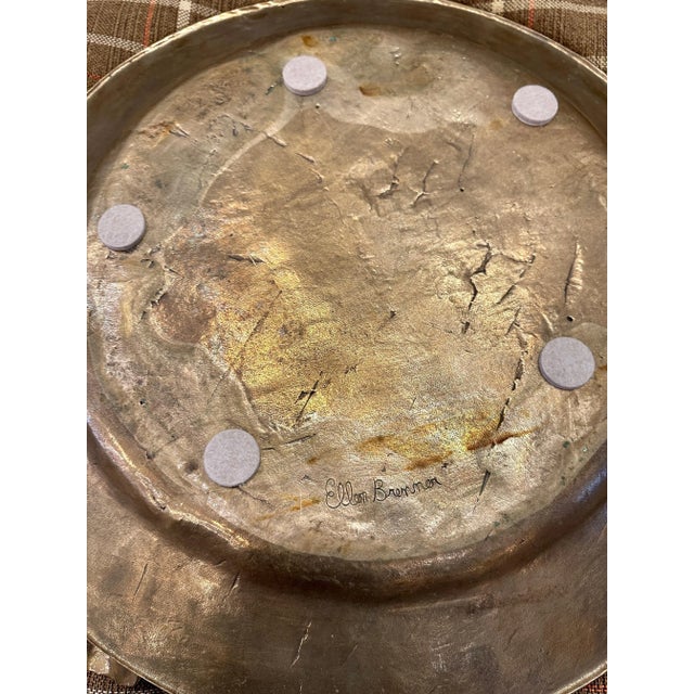 An incredibly unique sculptural platter by artist, Ellen Brenner (signed to verso). The verdigris patina on the bronze...