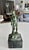 Smaller scale bronze statue depicting the Greek god Poseidon (or Roman god Neptune) holding his signature trident. The...