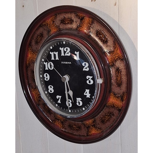 Vintage Round Wall Clock with Glazed Ceramic Case from Dugena, 1970s, in Very Good conditions. Designed 1970 to 1979 This...