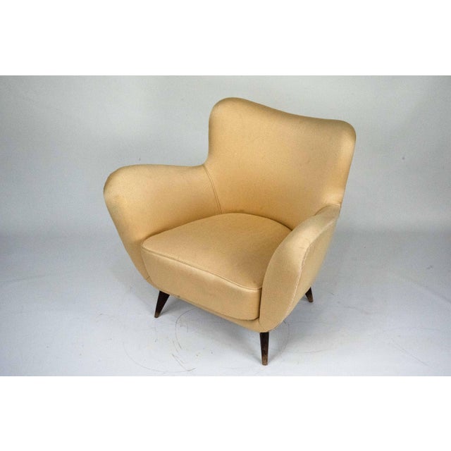 Elegant single lounge armchair designed by Guglielmo Veronesi and produced in Italy during the 1950s. This refined piece...