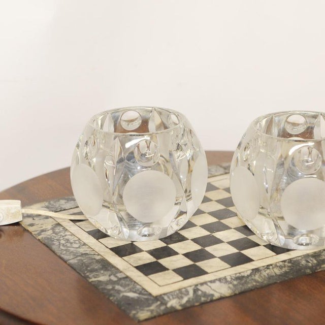 A pair of 1970s german peill and putzler frosted and clear glass circular table lamps with convex indentations which...