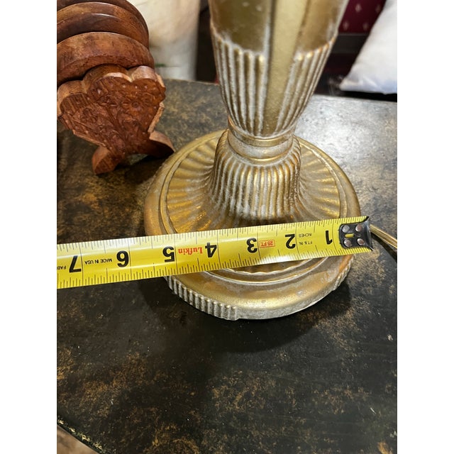 Up for consideration is a beautiful vintage tall brass table lamp with the lampshade included. This would look lovely in...
