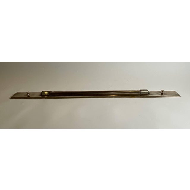 Monumental nautical rolling rule in very good condition. Highly polished. Smooth wheels and gears. Finger knobs are...