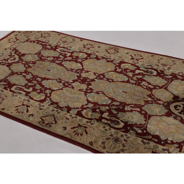 Handmade in wool and originating from Germany circa 1920-1930, this 4x7 antique hooked rug is an exceptional find of the...