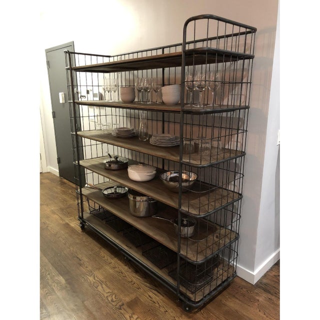 Extremely rare and sought-after circa 1900s extra large Bakers rack from Restoration Hardware. Functioning casters and...