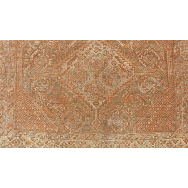 Textile Antique Distressed Persian Shiraz Rug in Shades of Soft Orange, Lt. Brown, Gray 5'6 X 8'6 For Sale - Image 7 of 13