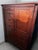 this piece is amish made. the wood is rustic cherry hardwood. it is roughly 3 years old. purchase price was around 2,000...