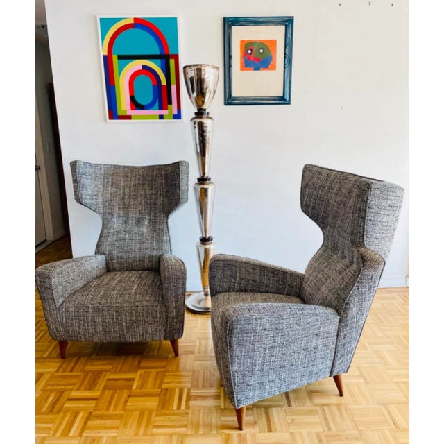 These chairs are truly a modern interpretation, with a Mid-Century Italian flair, of that quintessential American...