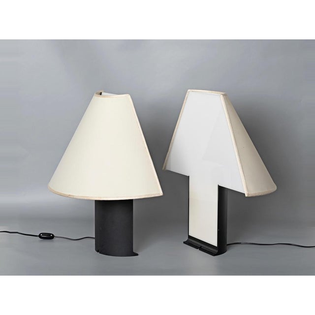 Stunning pair of large "edipo" table lamps in a beautiful black and white combination. This rare and unique lamps were...