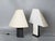 Stunning pair of large "edipo" table lamps in a beautiful black and white combination. This rare and unique lamps were...