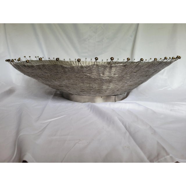 Rare vintage "Splash" Bowl Centerpiece by Michael Aram. Made of woven wire, and brass ends, made to resemble a splash of...