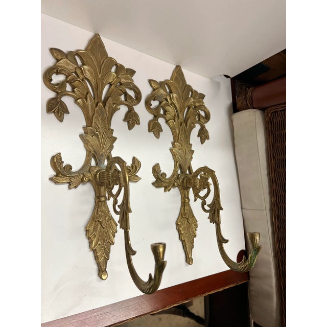 Mid century sconces. Great decorative Hollywood regency style. Ready to hang on the wall. One of them has a small hole the...