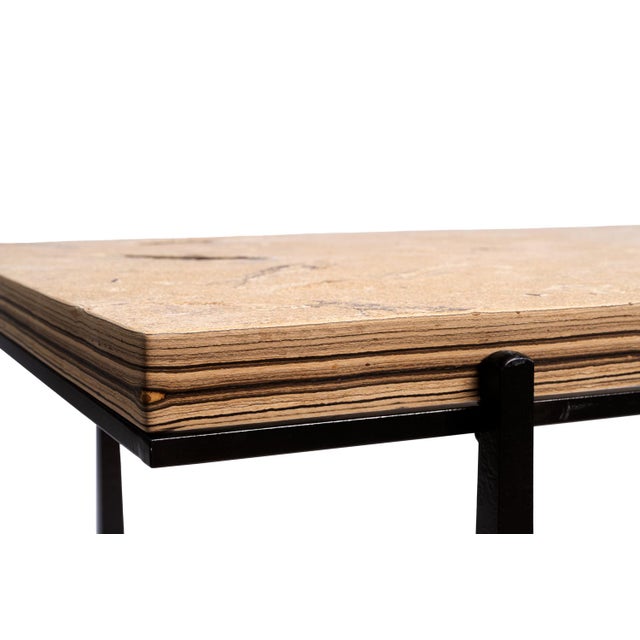 A 50" x 28" x 1-5/8" stone top with a brushed finish. The fossils include two Diplomystus dentatus measuring 16-1/2" and...