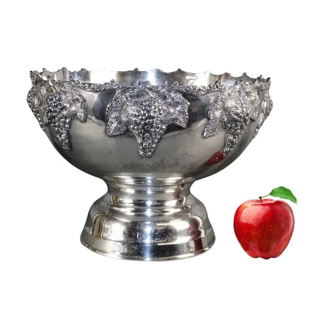 This elegant French champagne urn, crafted in silverplate, is a stunning celebration of refinement and sophistication....