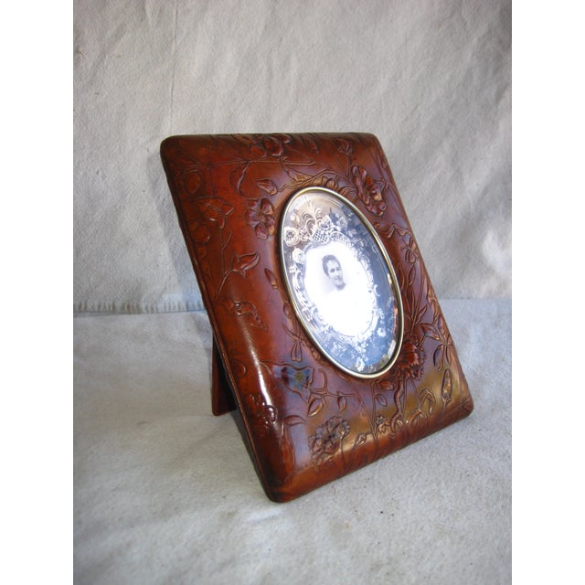 This very rare piece is multifunctional it s a picture album but also a picture frame , it is a french art nouveau period...