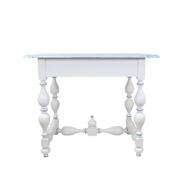 This stunning vintage French Louis XIII style game table features a beautifully distressed pure white finish, subtly...