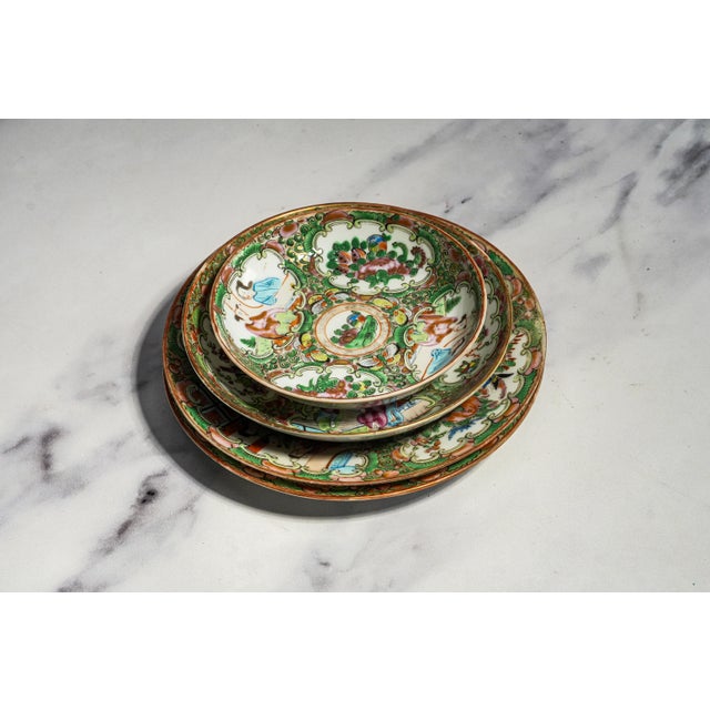 This beautiful collection of four antique Chinese Export porcelain plates presents a wonderfully decorative assortment of...