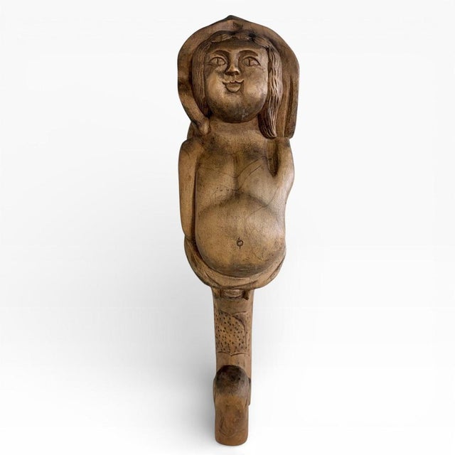 A striking antique hand-carved wooden mermaid wall sculpture, rich in character and folk-art charm. Beautifully sculpted...