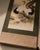 A refined vintage Japanese kakejiku hanging scroll featuring an auspicious composition of cranes, turtles, pine, plum...