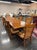 Acquisitions by Henredon nine-piece dining set: a substantial trestle-base extension dining table with two armchairs and...