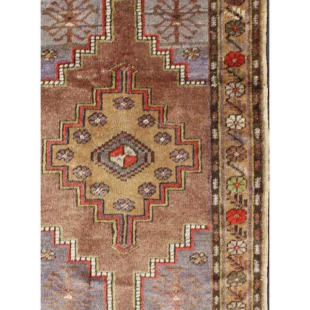 Colorful Vintage Turkish Oushak With Geometric Design. Vintage Turkish runner in green, soft yellow, pale purple, ivory,...