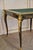 Portfolio game table, blackened wood from the napoleon iii period. ornamentation of bronzes gilded with spanish, mascaron...