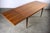 Stunning teak extension dining / conference table made by Niels Moller. Sturdy and built to not only last lifetimes more,...