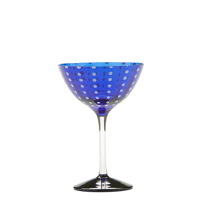Collection for the table in clear colored glass. It includes tumblers for water and soft drinks, wine glasses, flute...