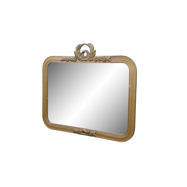 Antique French Louis XVI / Neoclassical gold gilt / gesso mirror featuring an elaborate Laurel Wreath crest design with...