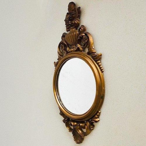 Beautiful Baroque mirror designed by Roberta Wood for Cimena Torino in the 1950s. The frame is beautifully decorated with...