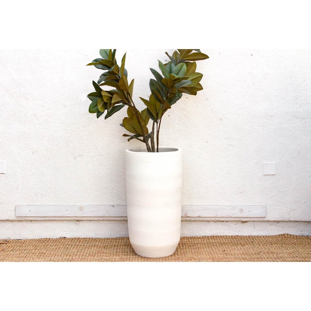 Minimalist in form and rich in texture, The Santorini Cylinder is a high-impact architectural planter designed for the...