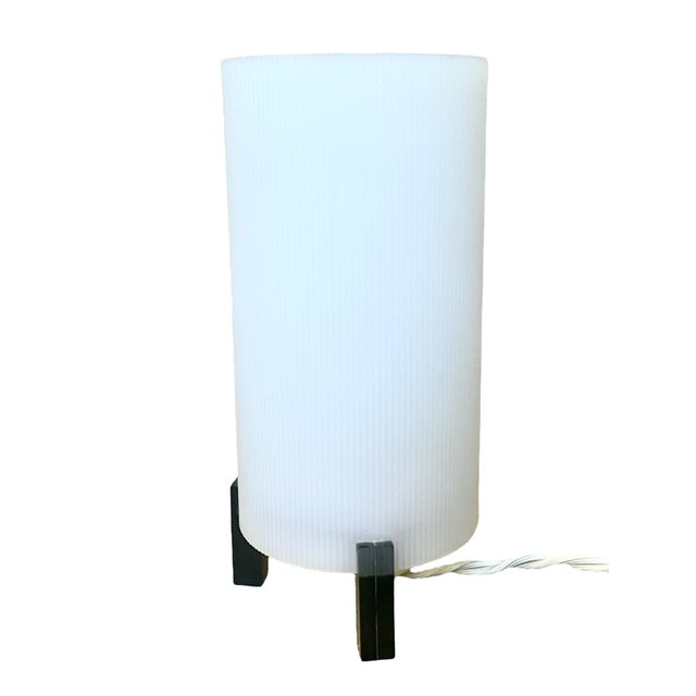 Two bedside lamps in a postmodern style. The form refers to the classic Far Eastern lamps - paper lanterns on a wooden...