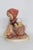 This adorable Girl with 3 Chicks Figurine is made of ceramic earthenware. This charming figurine titled "Chick Girl" is a...