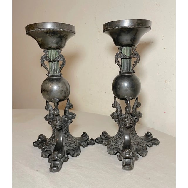 Delve into the elegance of the 19th century with these silverplate figural dolphin candlestick holders. Crafted with...