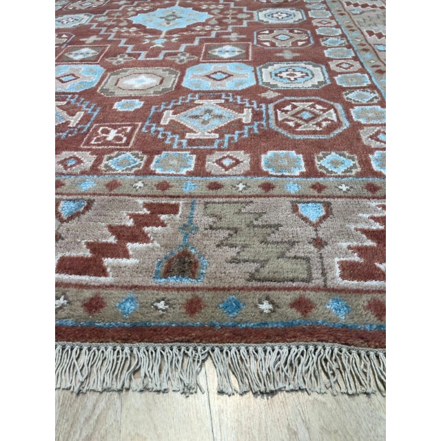 Penelope Traditional Coral Hand Knotted Wool Rug, Country of Origin: India. This exceptional piece showcases a dense,...