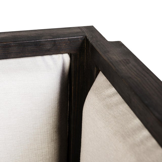 The Walker Upholstered Hanging Day Bed offers comfort and style perfect for lounging on a Sunday afternoon. The frame is...